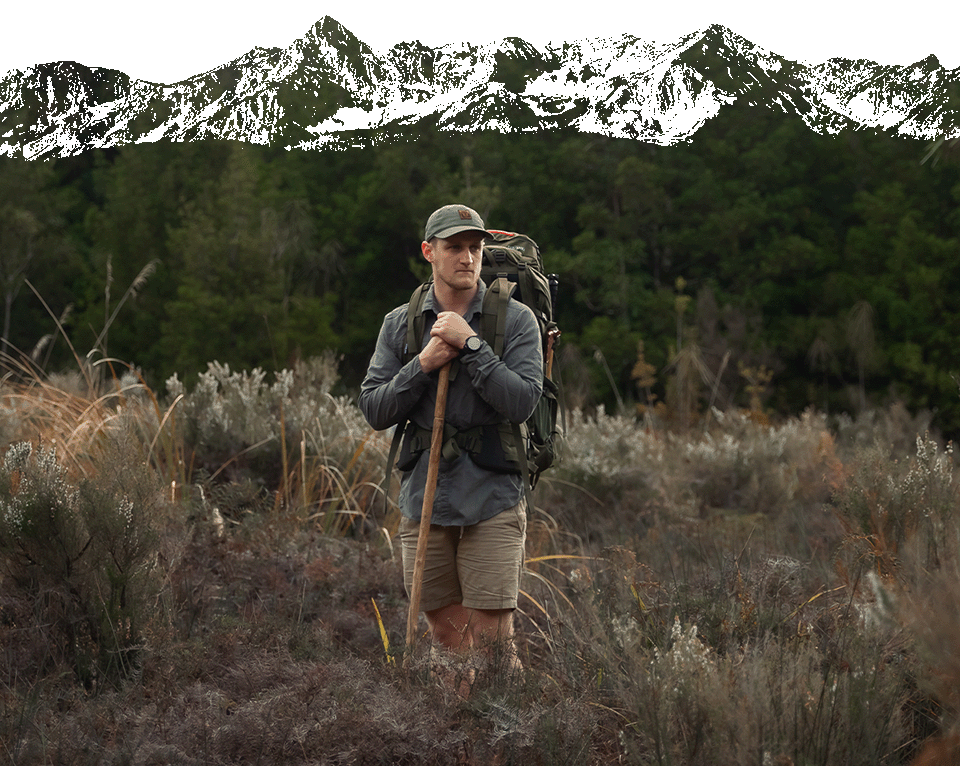 Founder of Falko standing in outdoor clearing during hike in wilderness